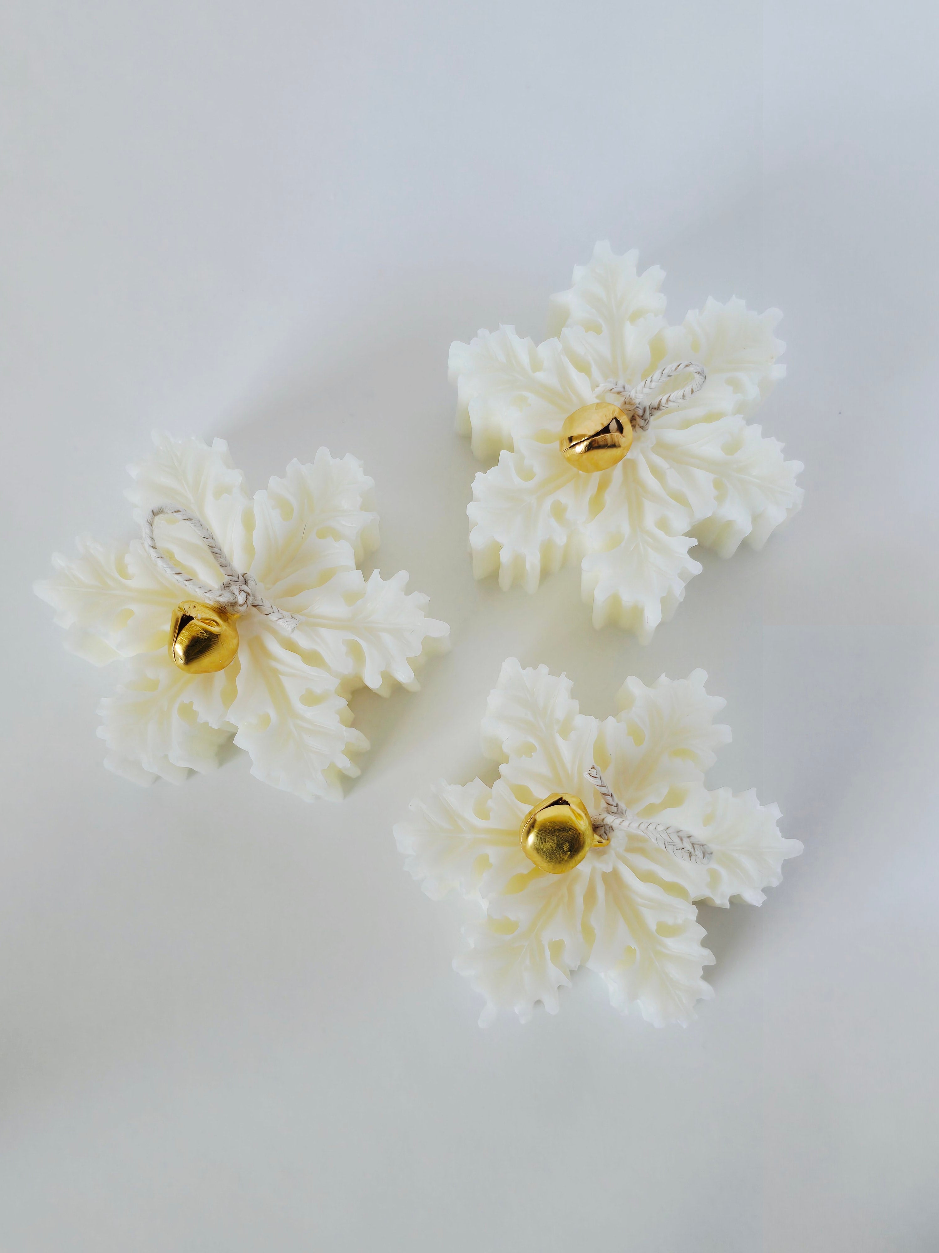 Schneeflockenkerze (mit Glöckchen)
