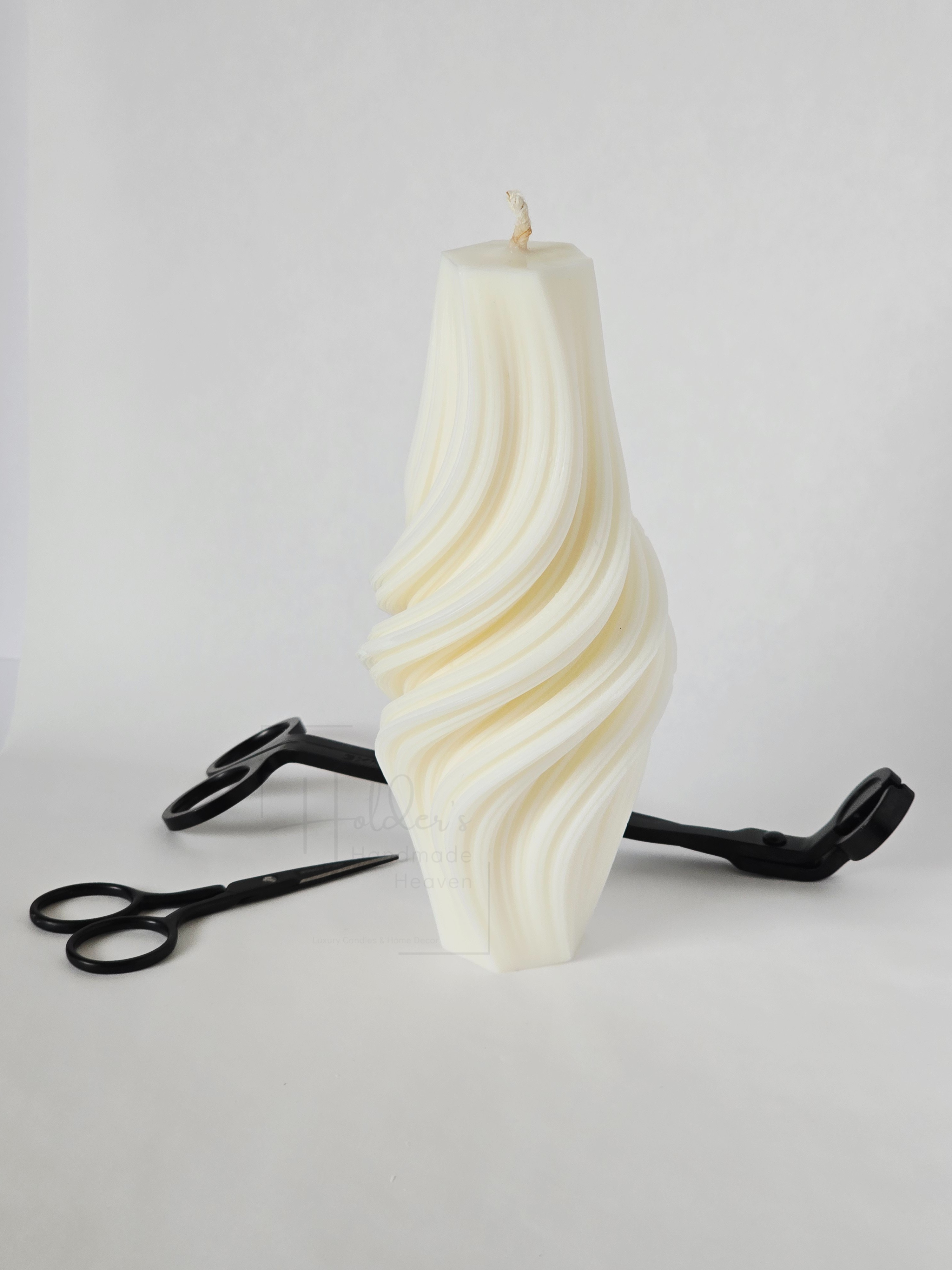 Twisted designer candle