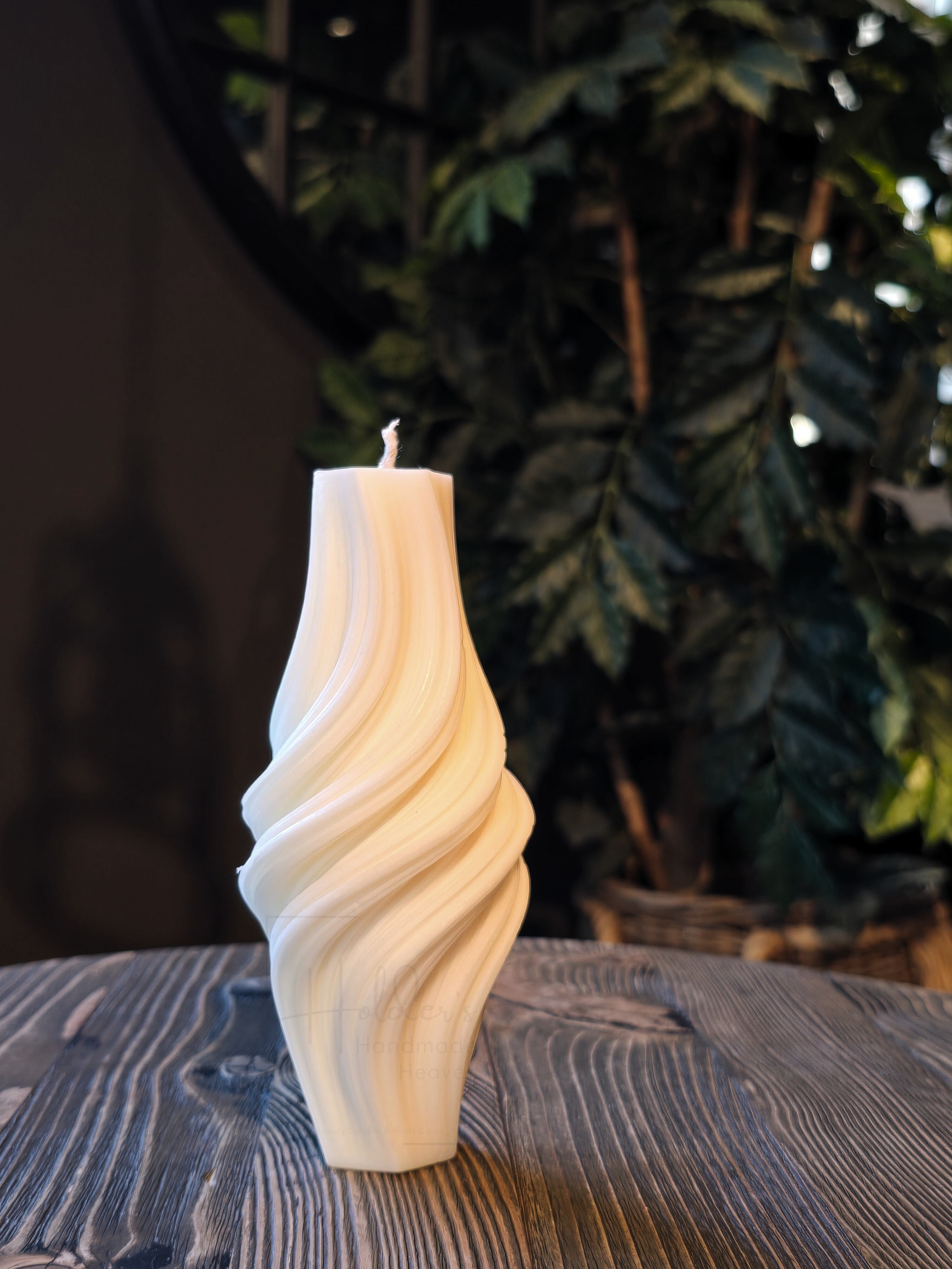 Twisted designer candle